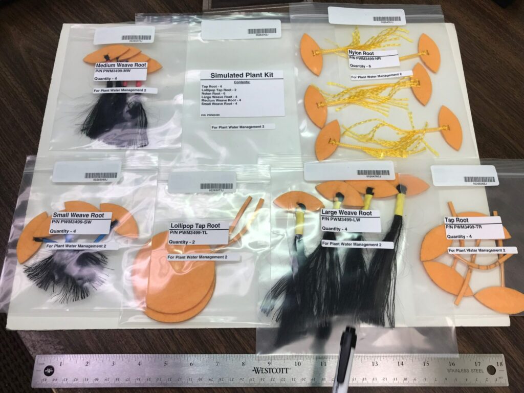 Small bags containing various simulated plant root systems