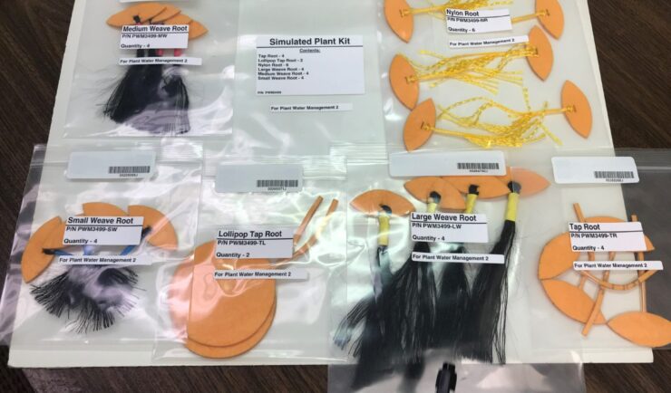 Small bags containing various simulated plant root systems